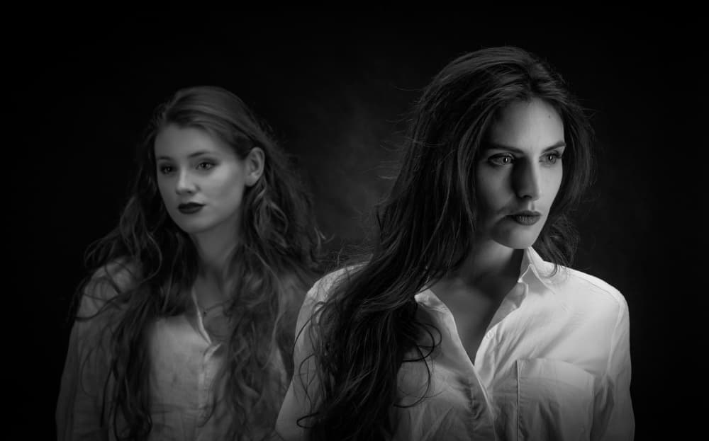 Intense Female Duo by Luc Stalmans — canvas wall art
