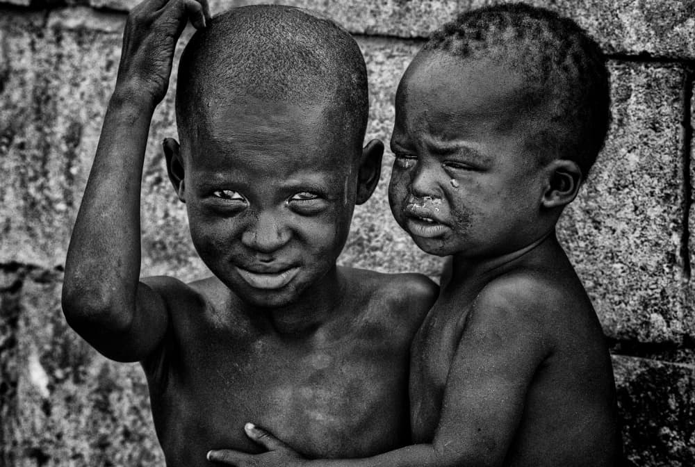 Young African Brothers by Joxe Inazio Kuesta Garmendia — canvas wall art