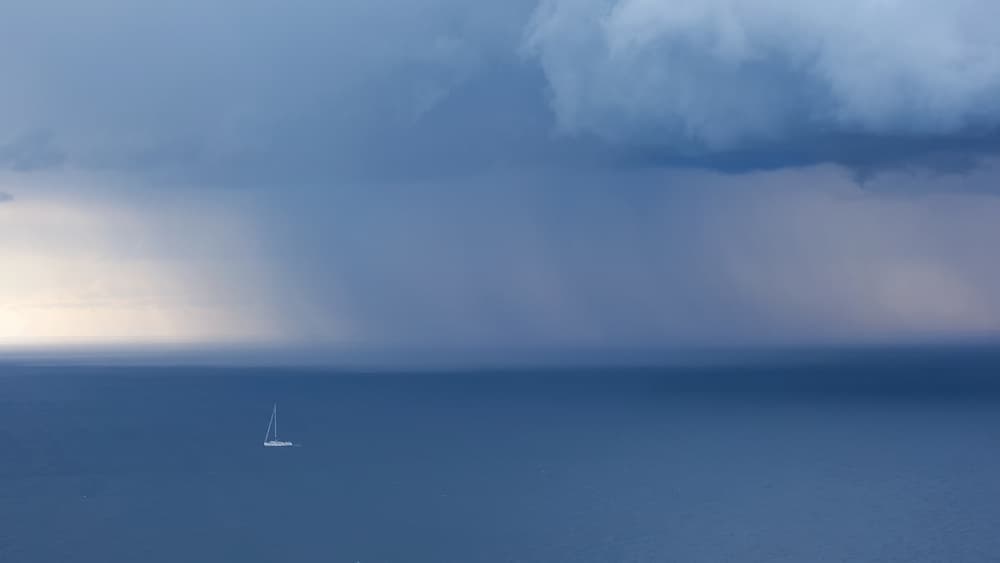 Solitary Sailboat Storm by Uschi Hermann — canvas wall art