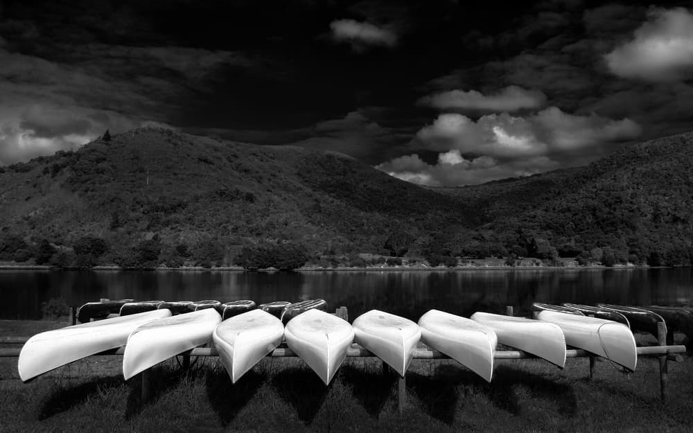 Mountain Lake Canoes by Hans-Wolfgang Hawerkamp — canvas wall art