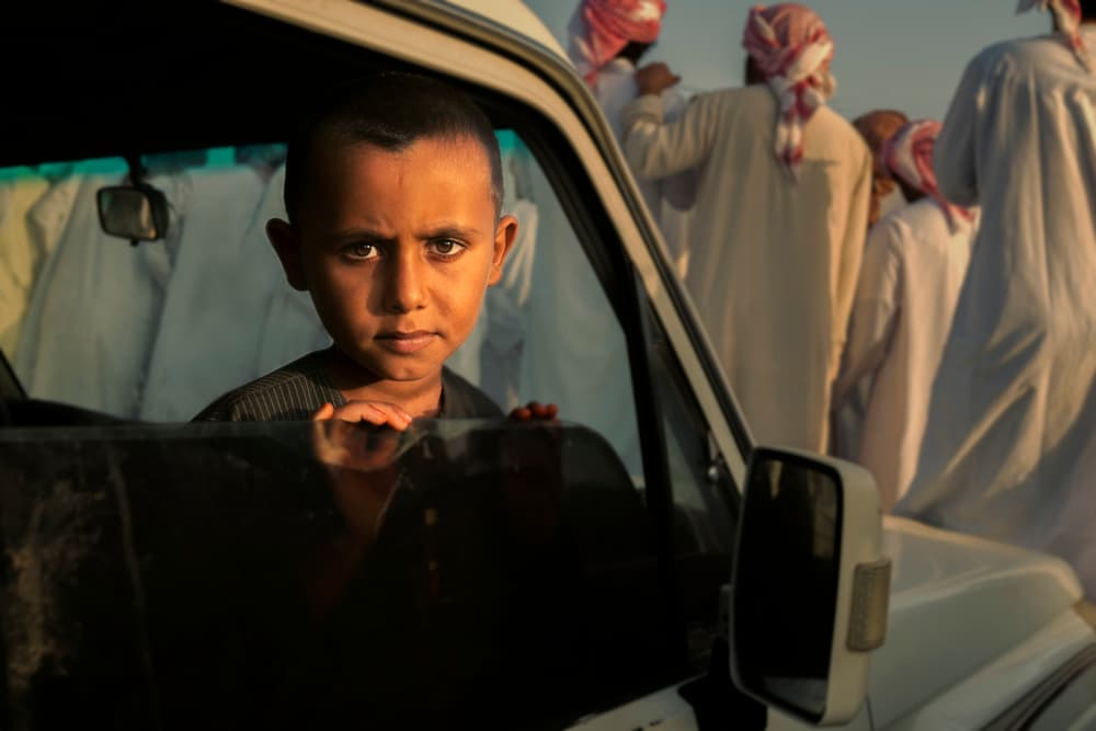 Young Boy's Gaze by Haitham AL Farsi — canvas wall art