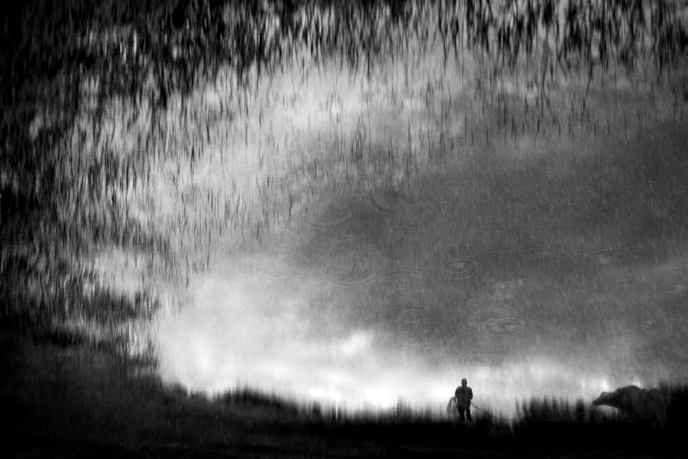 Man In Stormy Reflection by Ekkachai Khemkum — canvas wall art