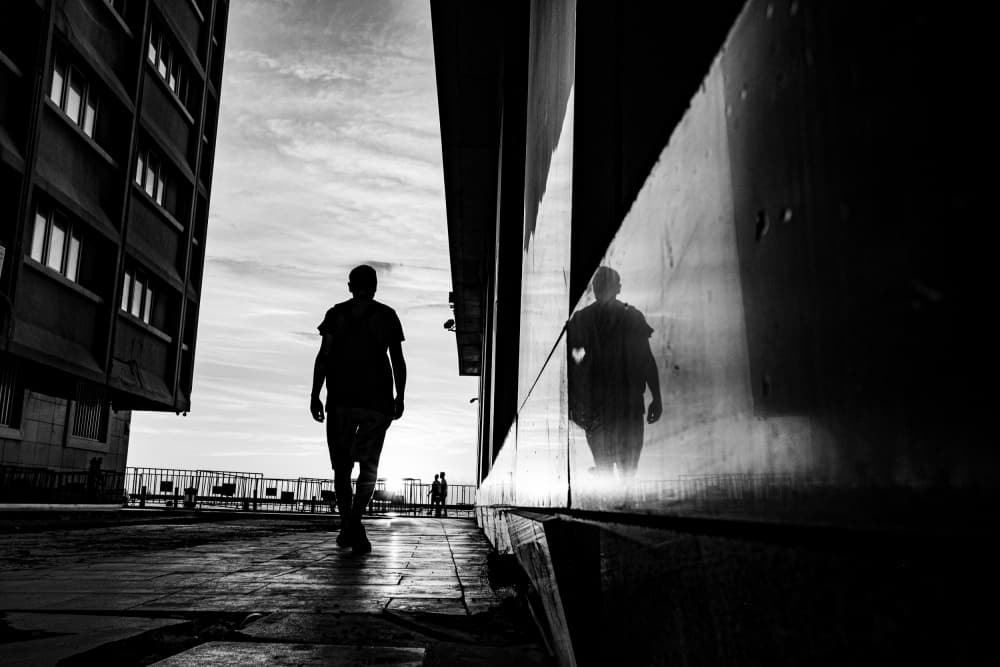 Urban Silhouette Reflection by Ali Ayer — canvas wall art