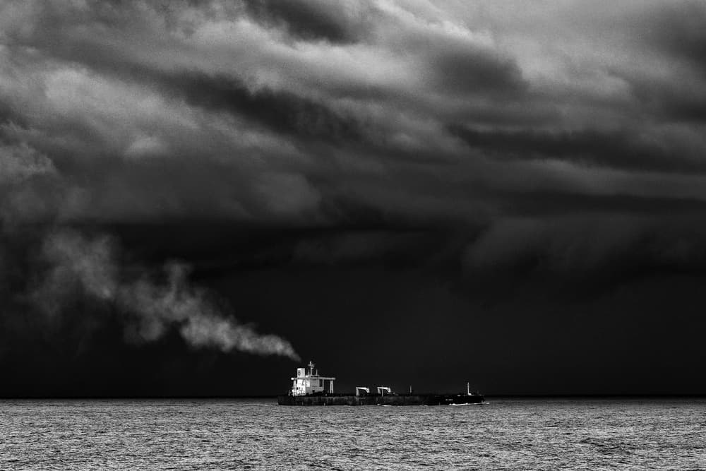 Ship Under Dark Clouds by Hans-Wolfgang Hawerkamp — canvas wall art