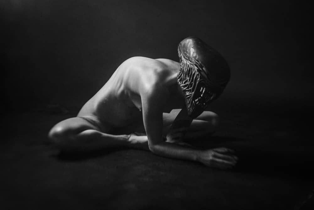 Contemplative Masked Woman by Bogdan Bouşcă — canvas wall art