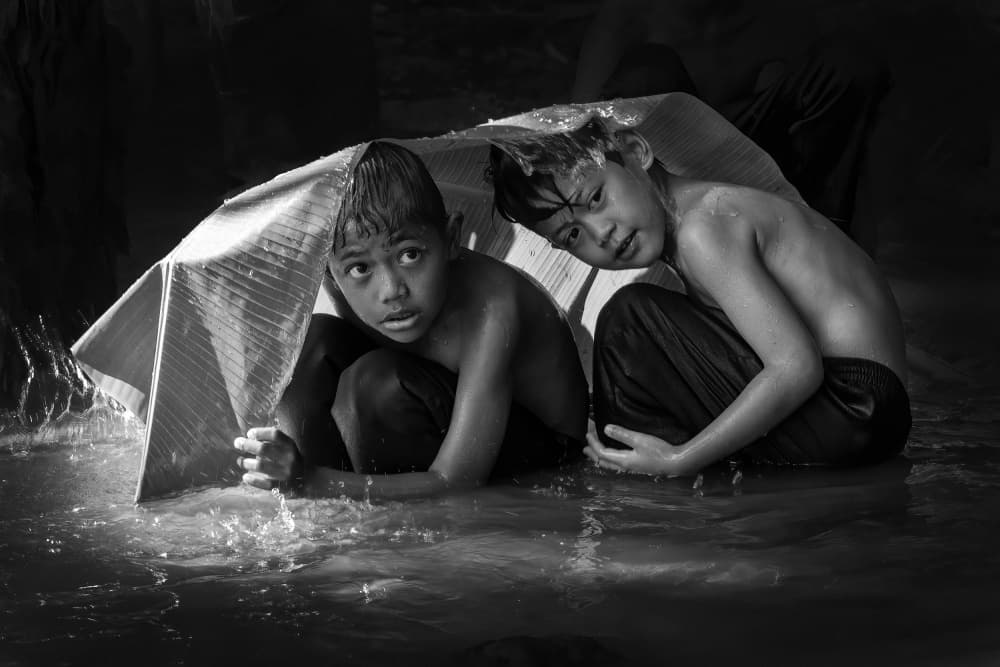 Boys In The Rain by Antonyus Bunjamin (Abe) — canvas wall art
