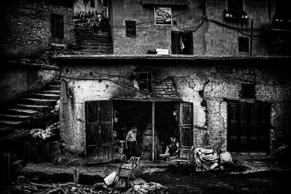 Old Shopfront Scene by Joxe Inazio Kuesta Garmendia — canvas wall art