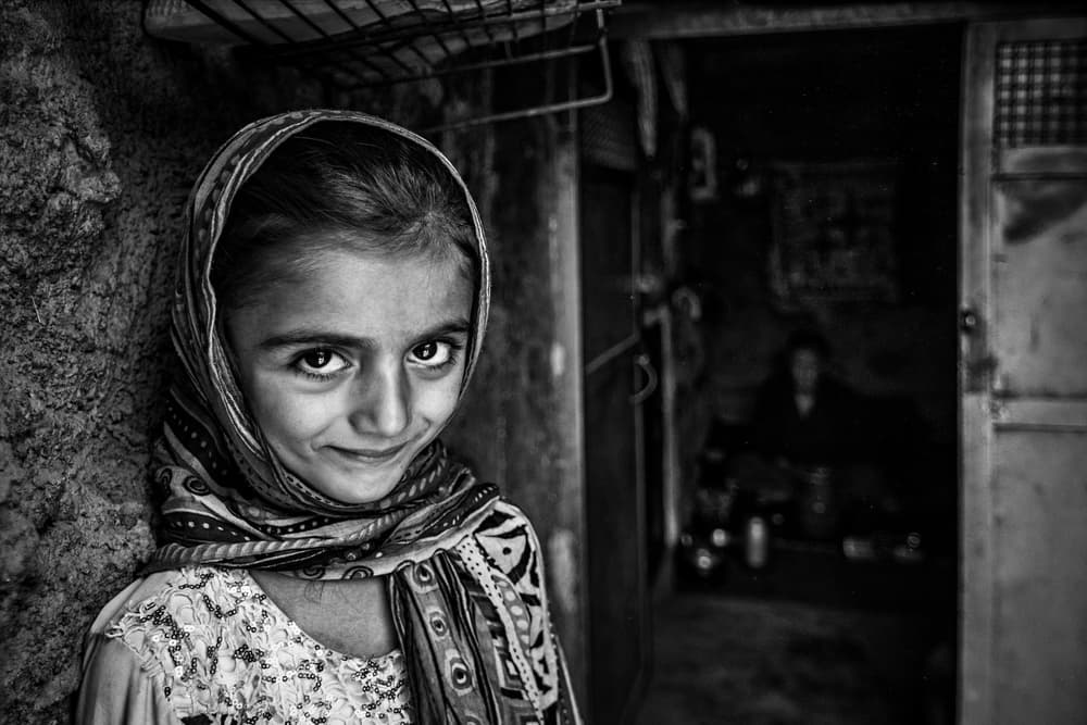Smiling Girl In Scarf by Babak Mehrafshar — canvas wall art