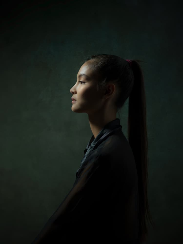 Serene Woman Profile by Thanakorn Chai Telan — canvas wall art