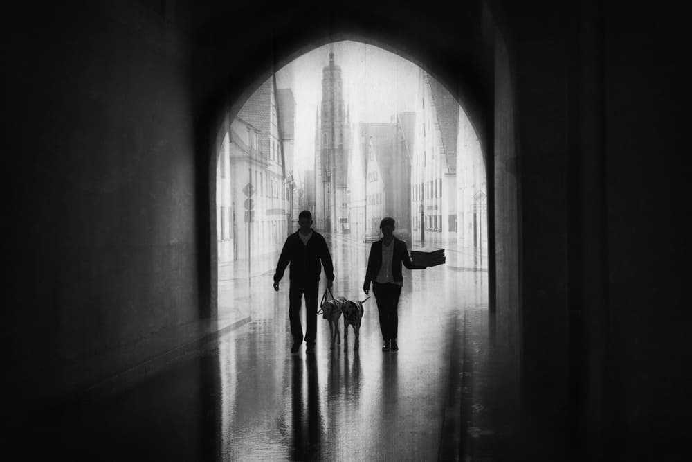 Couple's Rainy City Walk by Roswitha Schleicher-Schwarz — canvas wall art