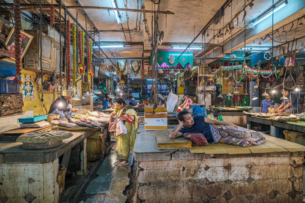 Busy Indian Fish Market by Subhajit Das — canvas wall art