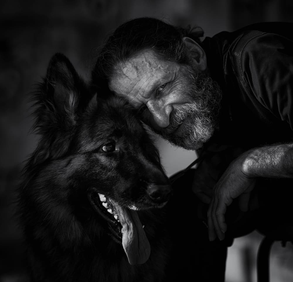 Man and Dog Love by Yuri Shepelev — canvas wall art