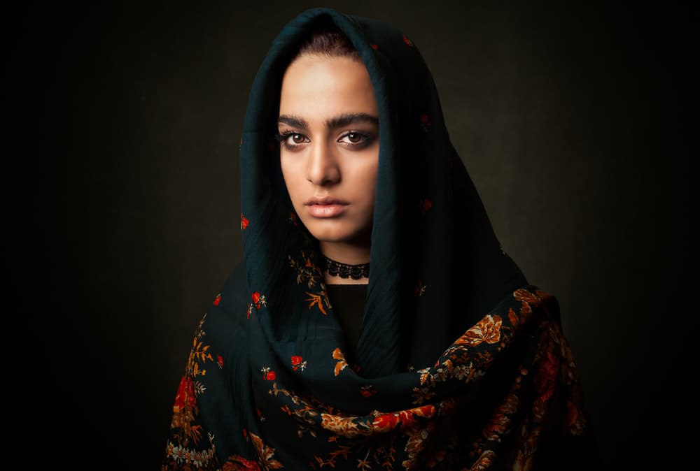 Woman In Floral Scarf by Mehdi Mokhtari — canvas wall art