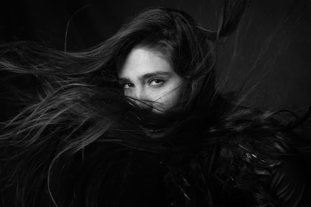 Enigmatic Gaze Flowing Hair by Mehdi Mokhtari — canvas wall art