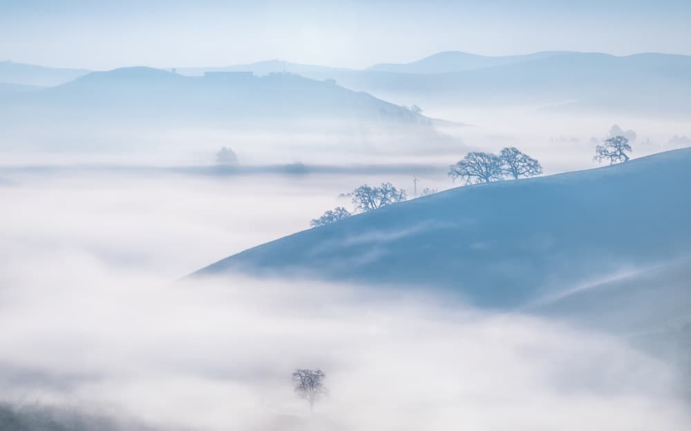 Misty Morning Hills by Jenny Qiu — canvas wall art