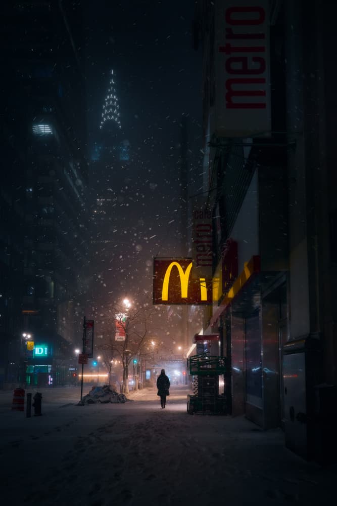 Snowy City Night by Javier de la Torre — canvas wall art