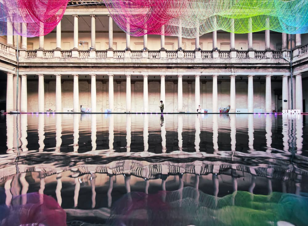 Rainbow Courtyard Reflection by Marco Tagliarino — canvas wall art