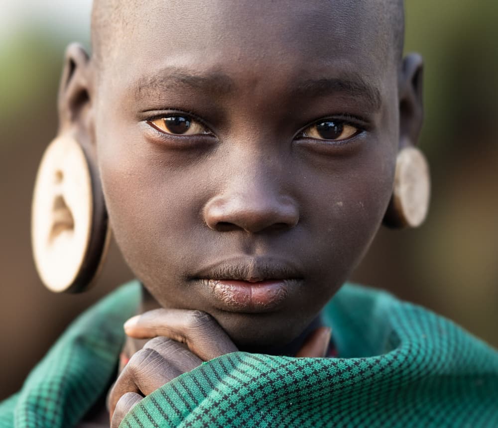 African Youth Portrait by Hamza Qarooni — canvas wall art