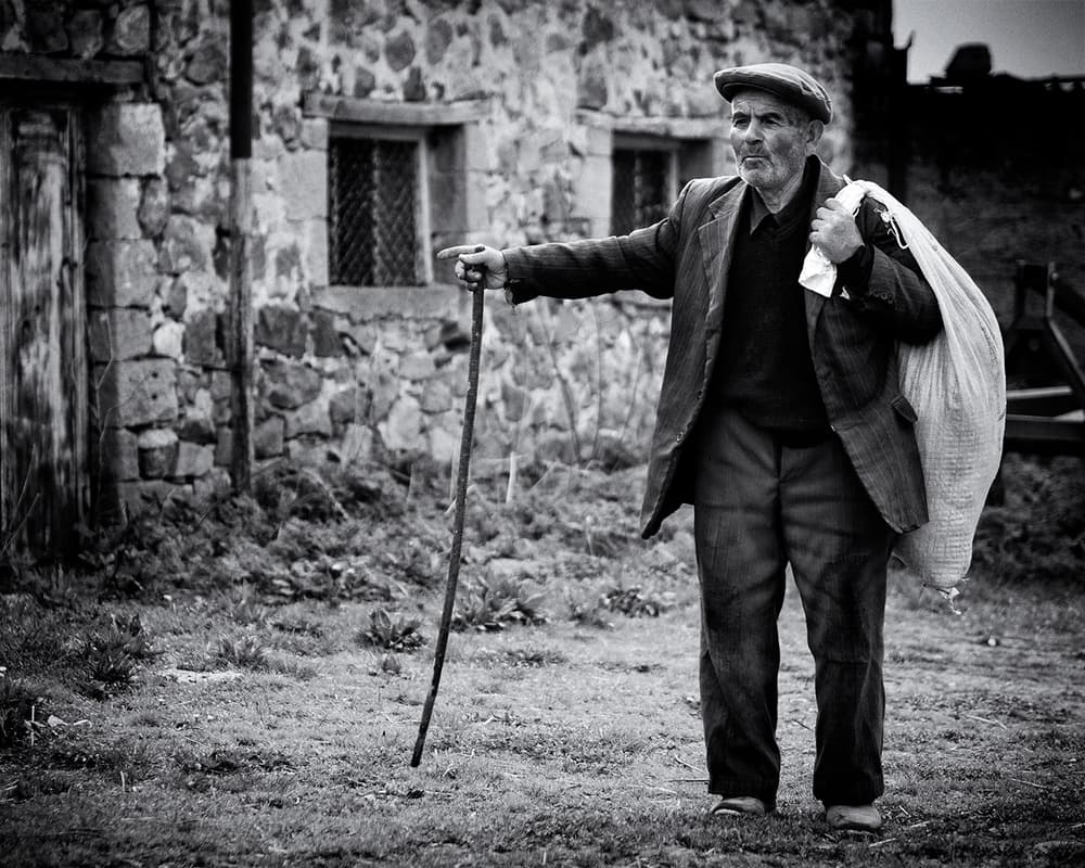 Rural Man With Sack by Marcel Rebro — canvas wall art