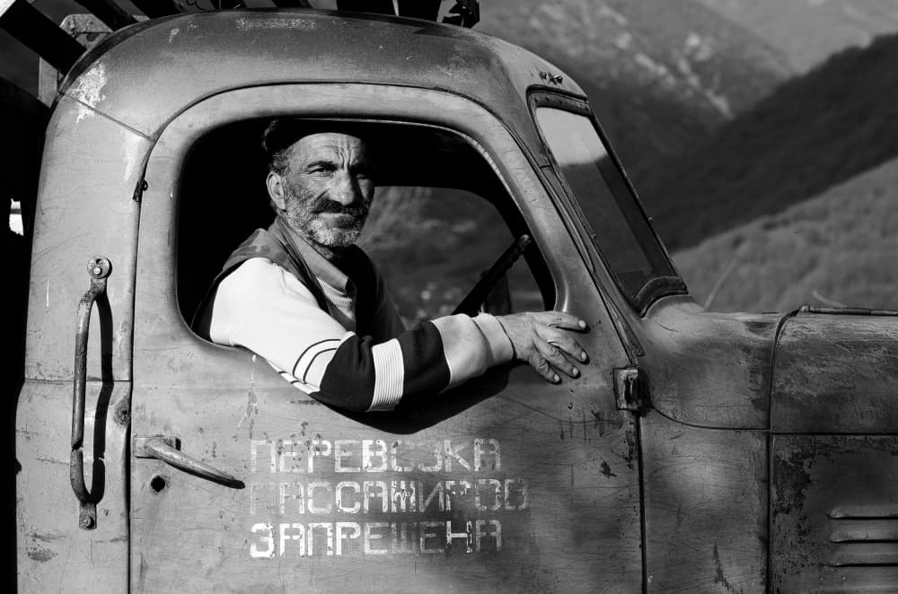 Old Truck Driver Portrait by Garik — canvas wall art