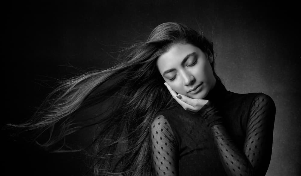 Serene Woman Flowing Hair by Mehdi Mokhtari — canvas wall art