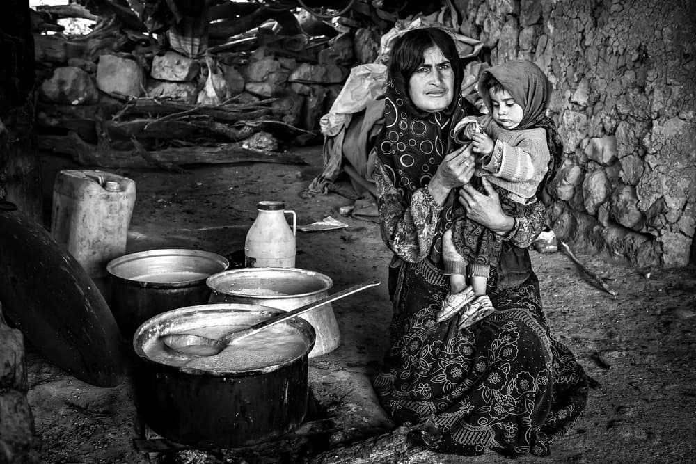 Mother And Child Cooking by Mohammadreza Momeni — canvas wall art