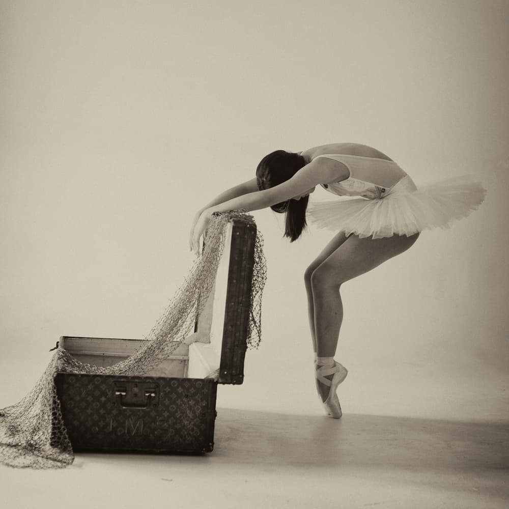 Ballerina's Elegant Stretch by Rob Li — canvas wall art