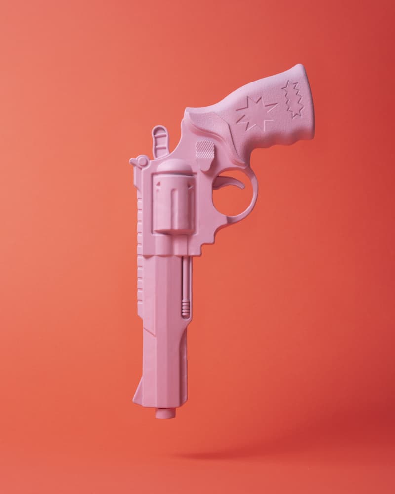 Floating Pink Revolver by Julia Ramiro — canvas wall art
