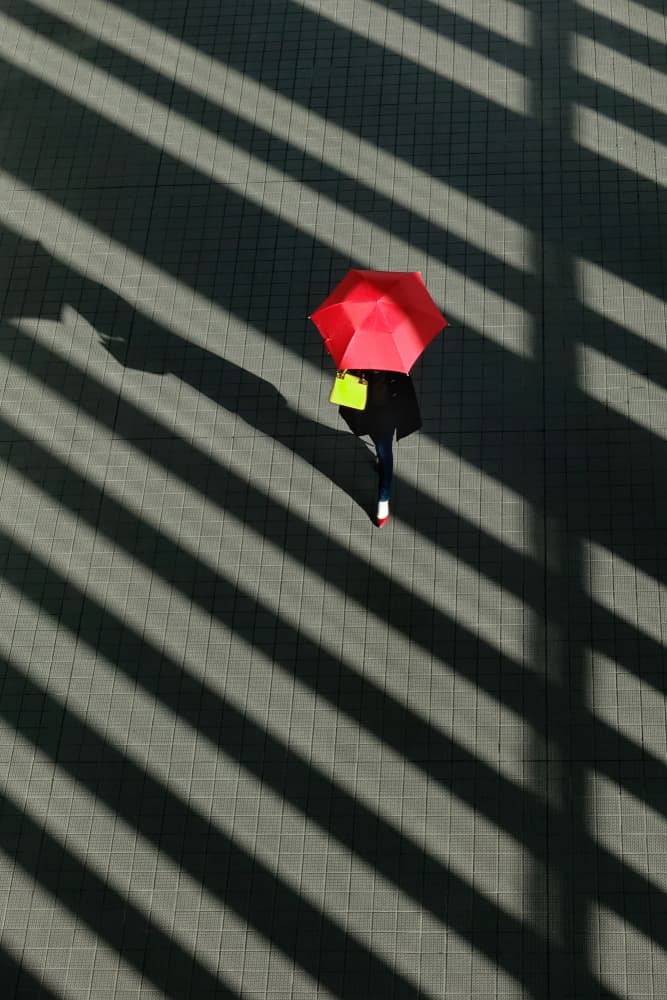 Red Umbrella Shadow Play by Haruyo Sakamoto — canvas wall art