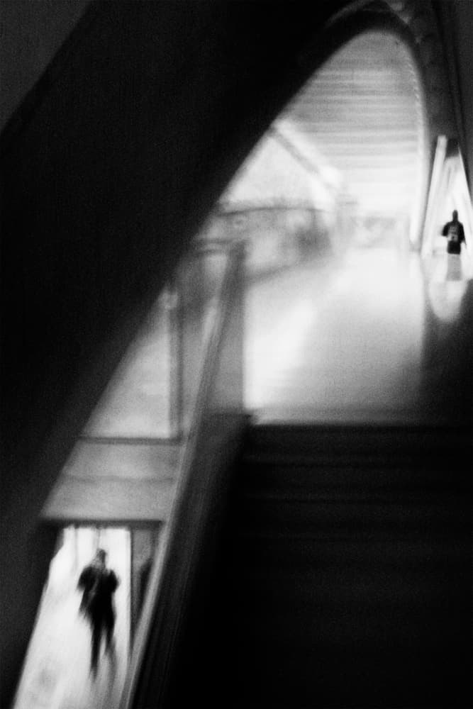 Blurred Figures on Stairs by Laura Mexia — canvas wall art