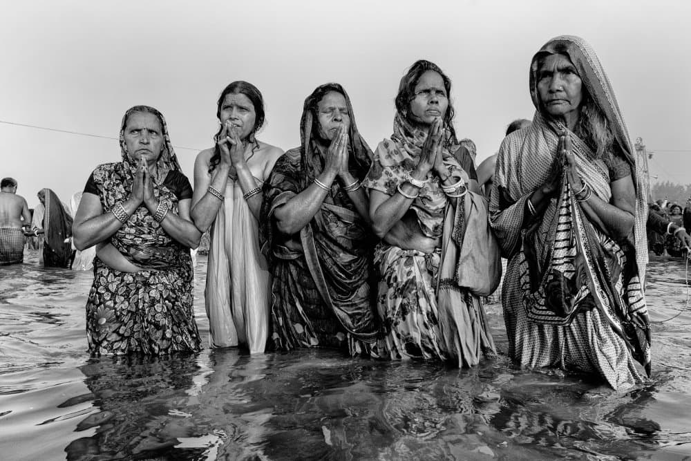 Praying Indian Women by Shaibal Nandi — canvas wall art