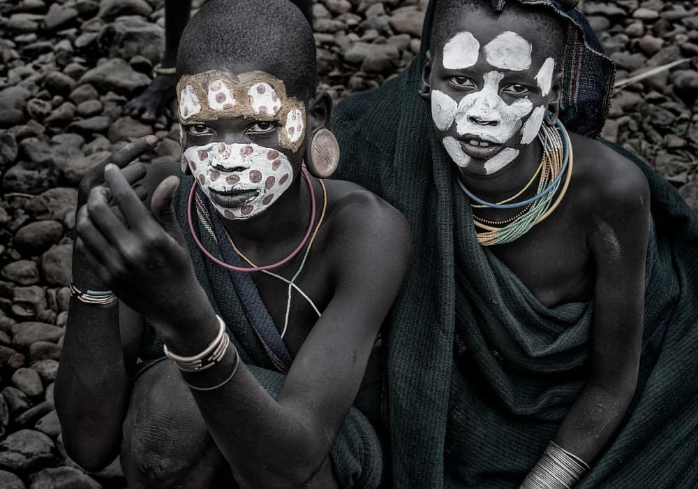 African Painted Faces by Joxe Inazio Kuesta Garmendia — canvas wall art