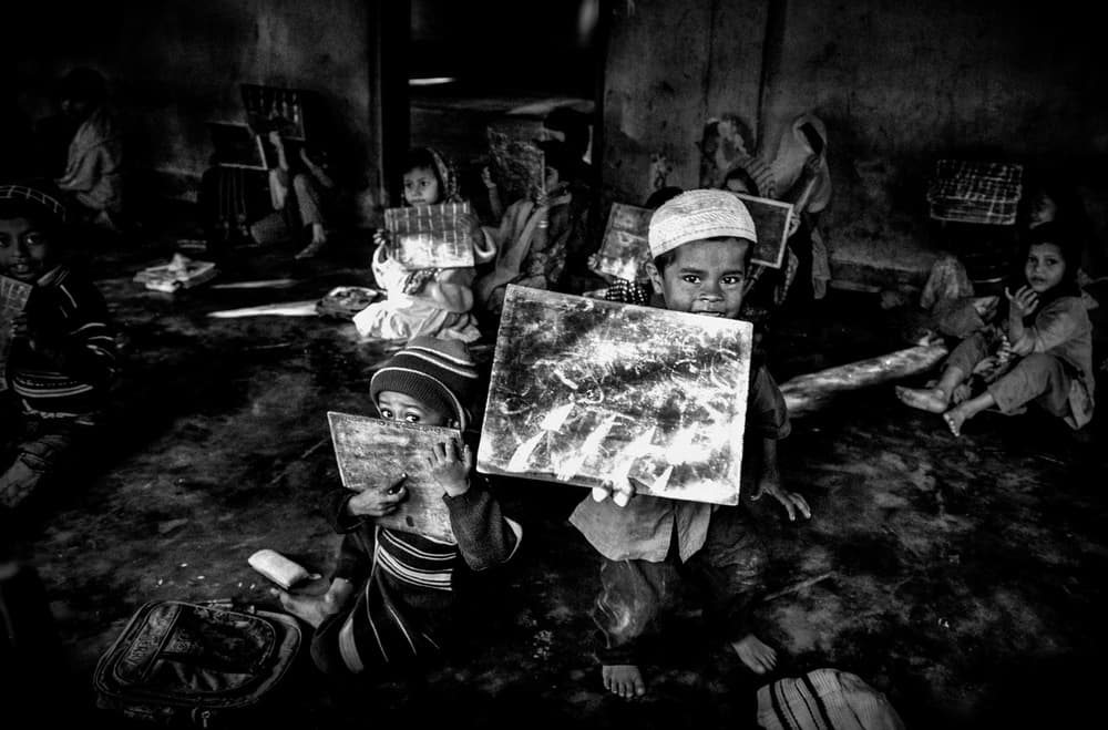 Young Students Learning Slates by Joxe Inazio Kuesta Garmendia — canvas wall art