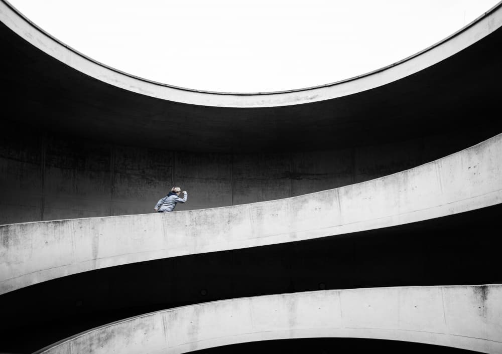 Lone Figure on Concrete Spiral by Michael Allmaier — canvas wall art
