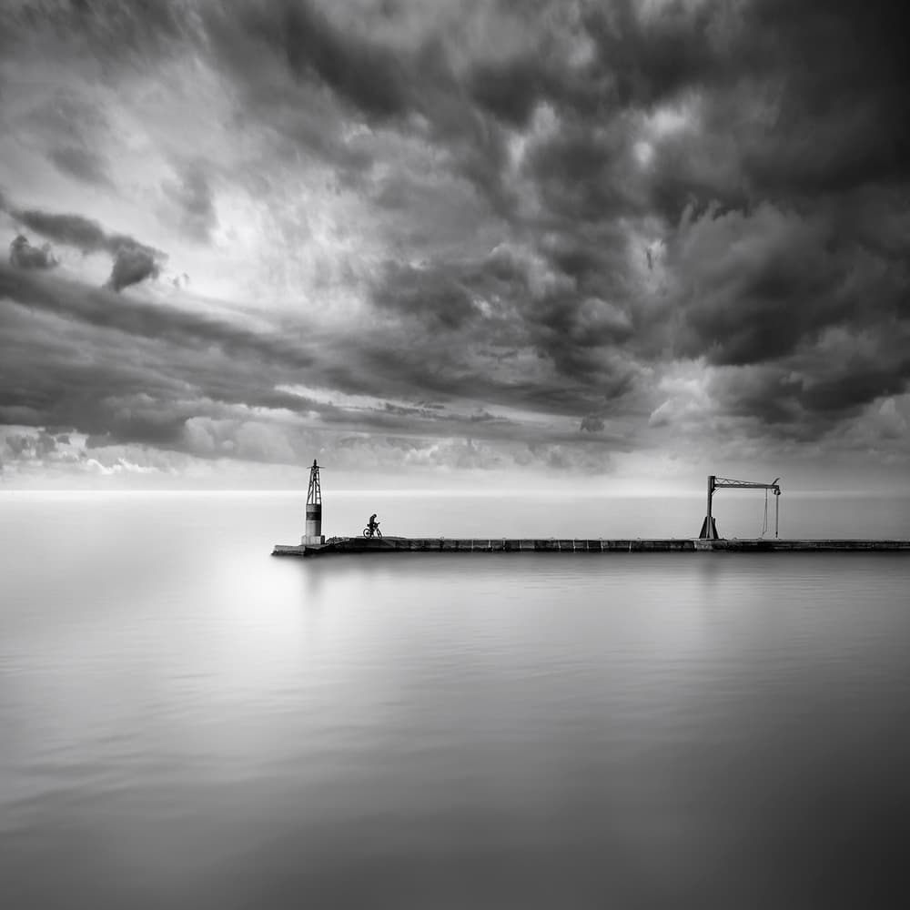 Moody Pier Lighthouse by George Digalakis — canvas wall art