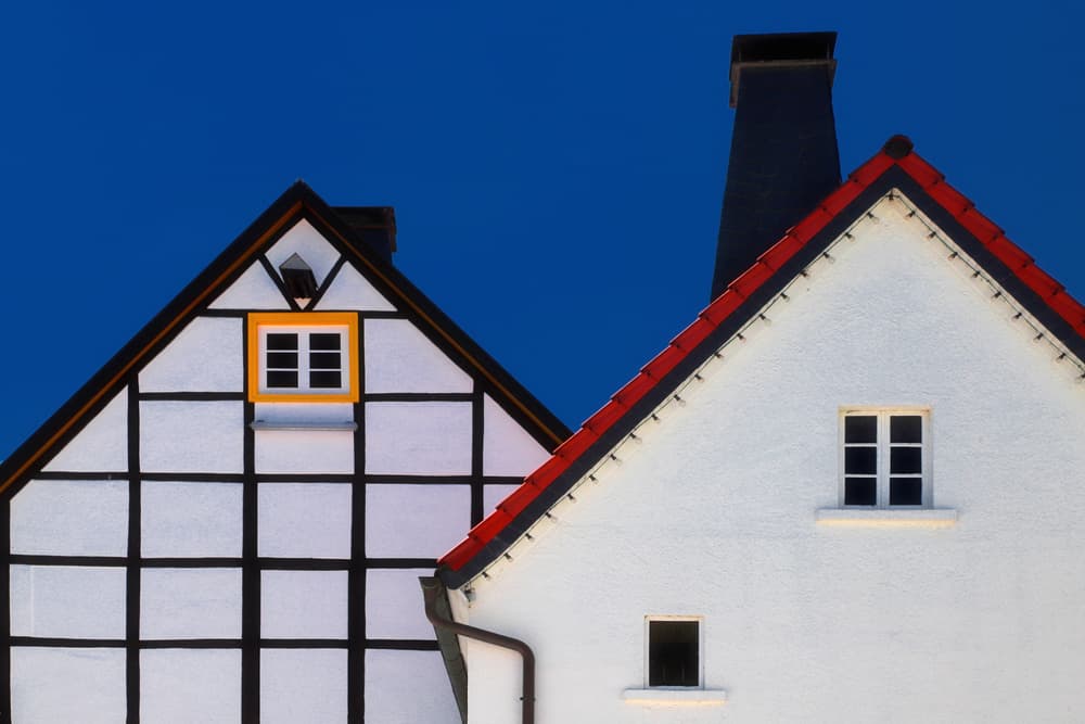 Contrasting Gables Blue Sky by Hans-Wolfgang Hawerkamp — canvas wall art