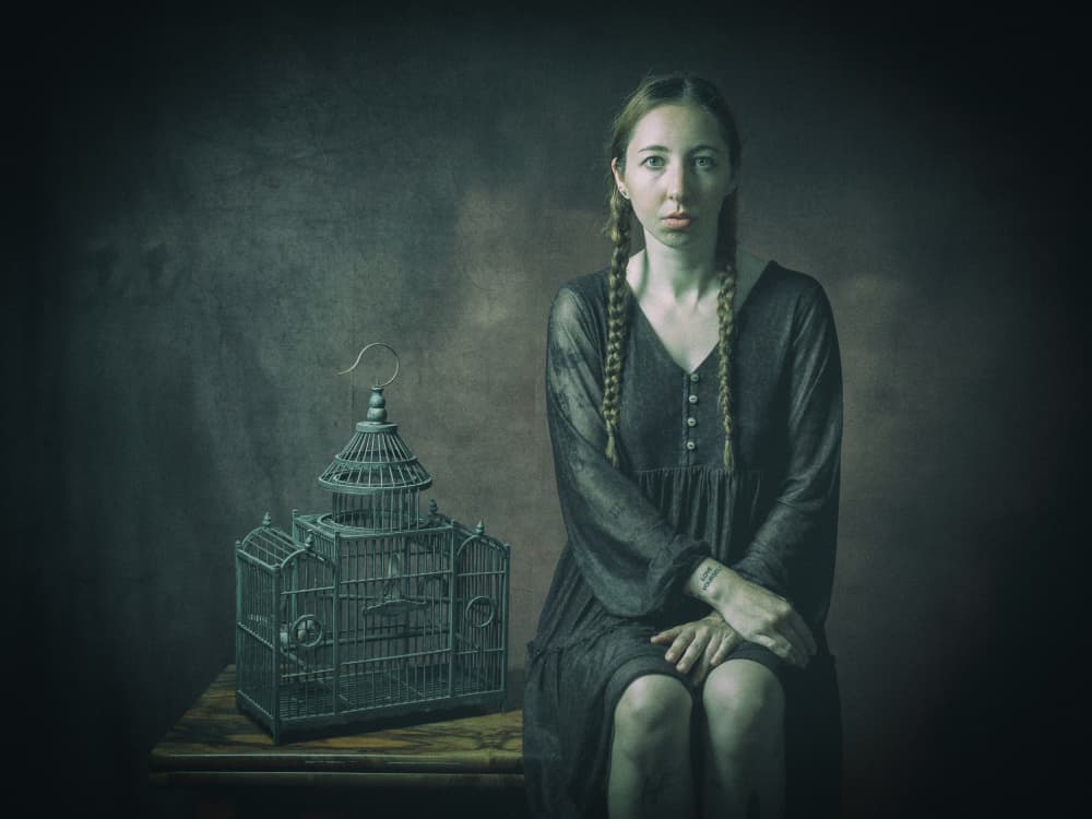 Young Woman and Birdcage by Ruth Franke — canvas wall art