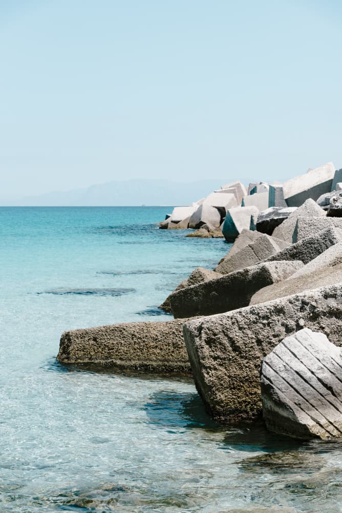 Turquoise Sea Breakwater by Photolovers — canvas wall art