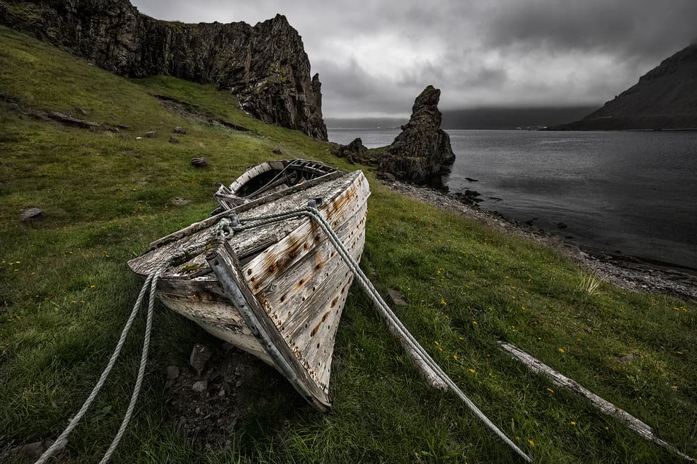 Weathered Fjord Boat by Bragi Ingibergsson - BRIN — canvas wall art