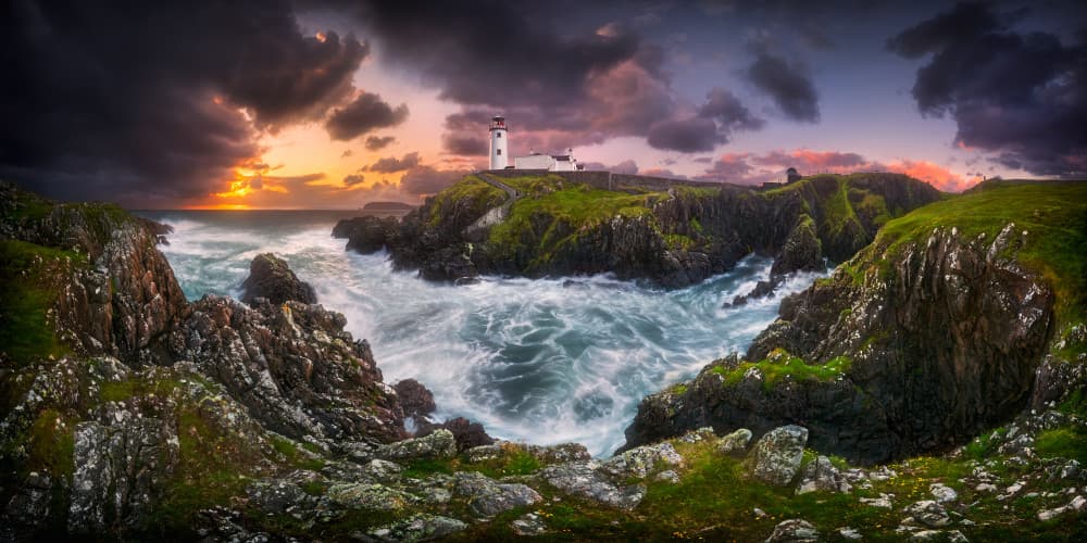 Wild Cliffs Lighthouse Sunset by Krzysztof Browko — canvas wall art