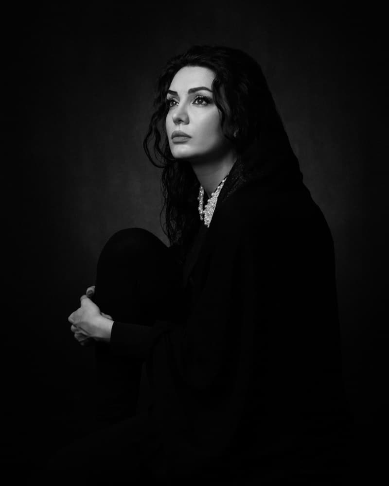 Elegant Woman Pondering by Mehdi Mokhtari — canvas wall art