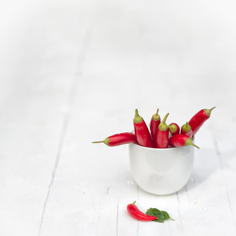 Vibrant Red Chilies by FranzStaab — canvas wall art