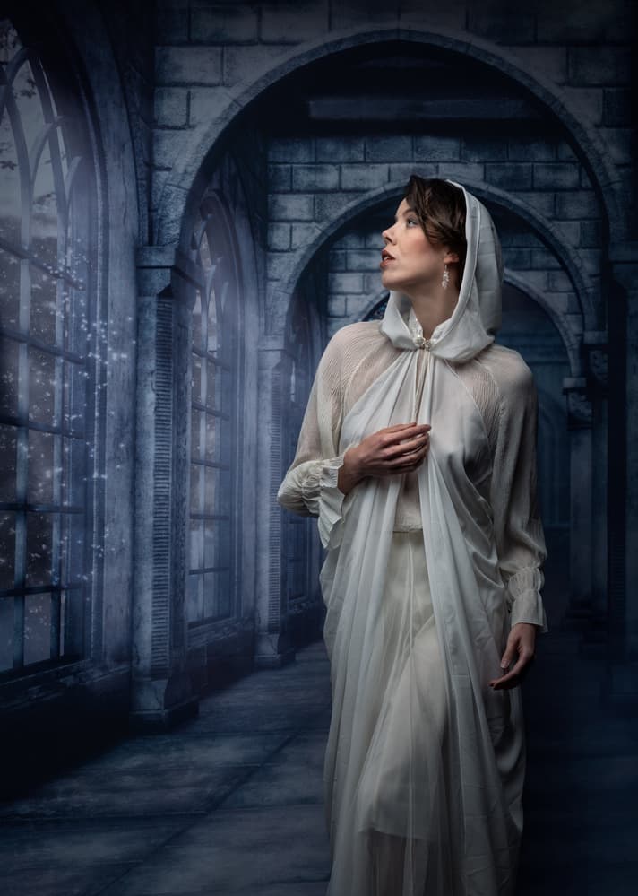 Hooded Woman in Gothic Archway by Luc Stalmans — canvas wall art