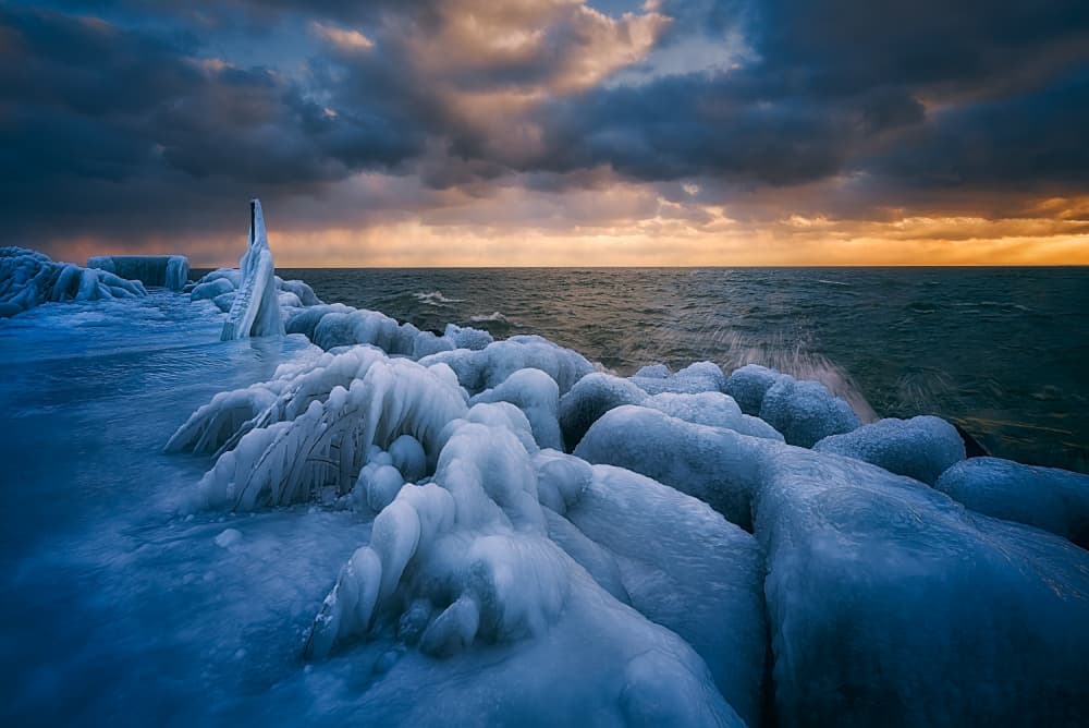 Icy Coast Sunset by Ben.C.L — canvas wall art
