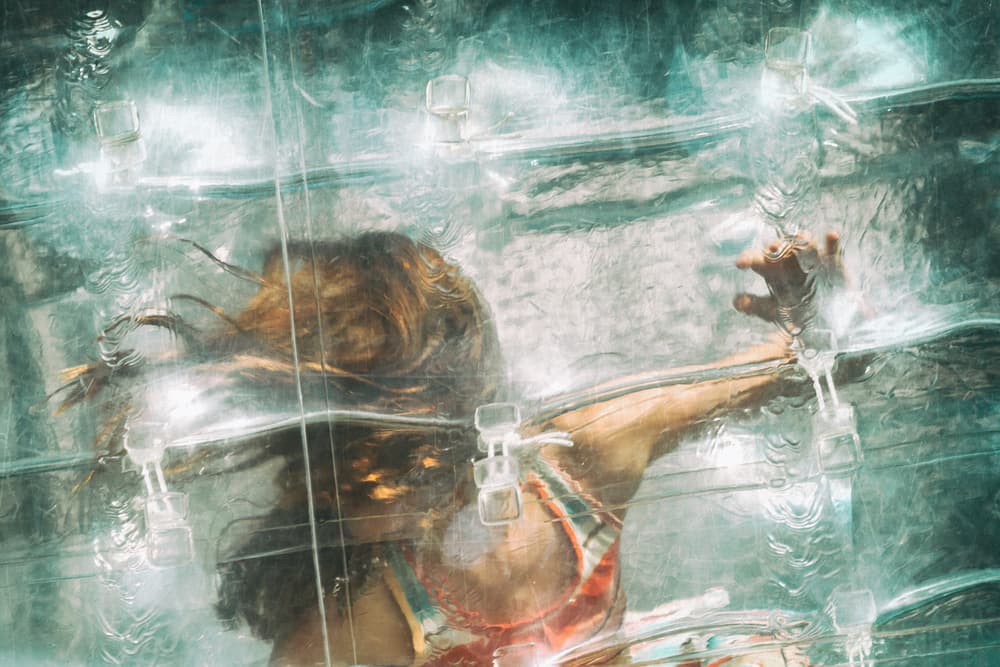 Woman Under Aqua Glass by Roswitha Schleicher-Schwarz — canvas wall art