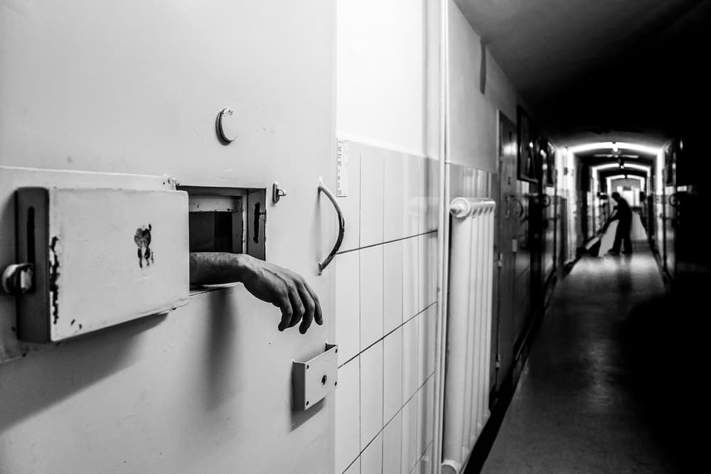 Hand From Prison Cell by Ovi D. Pop — canvas wall art