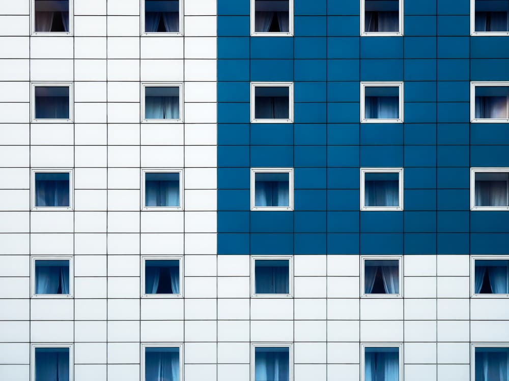 Blue and White Grid by Marius Surleac — canvas wall art