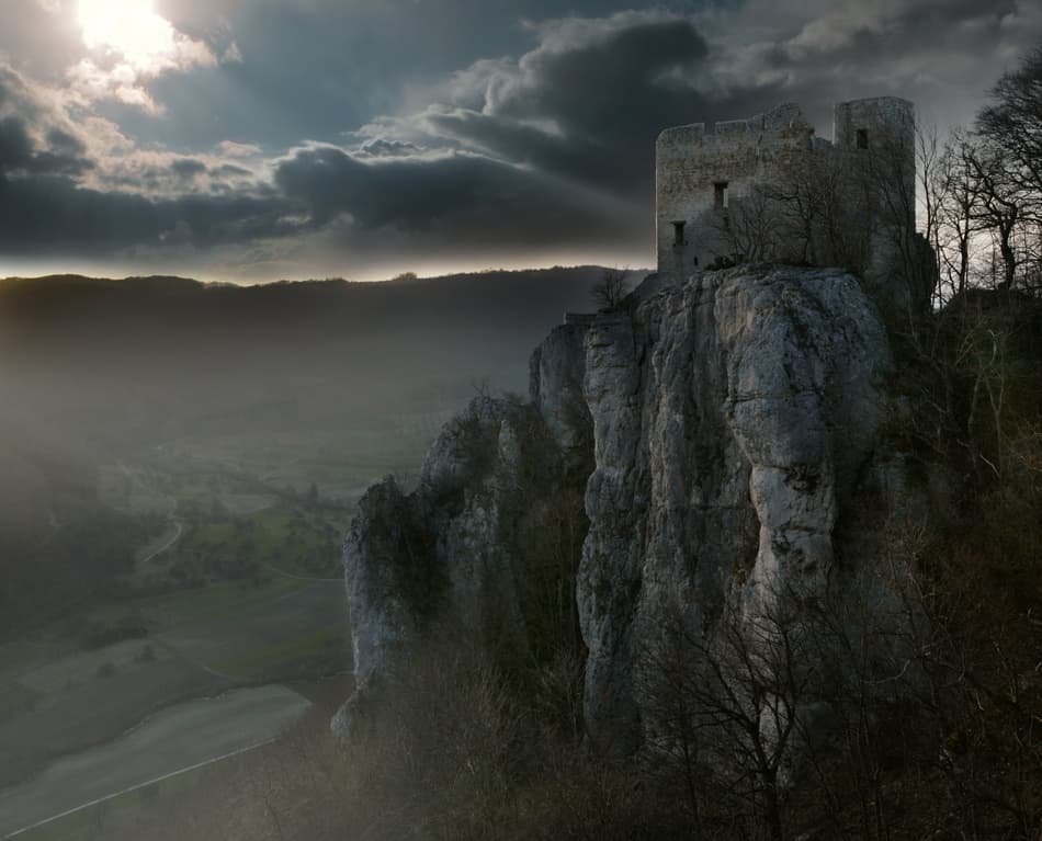 Dramatic Cliffside Castle by Nicolas Schumacher — canvas wall art