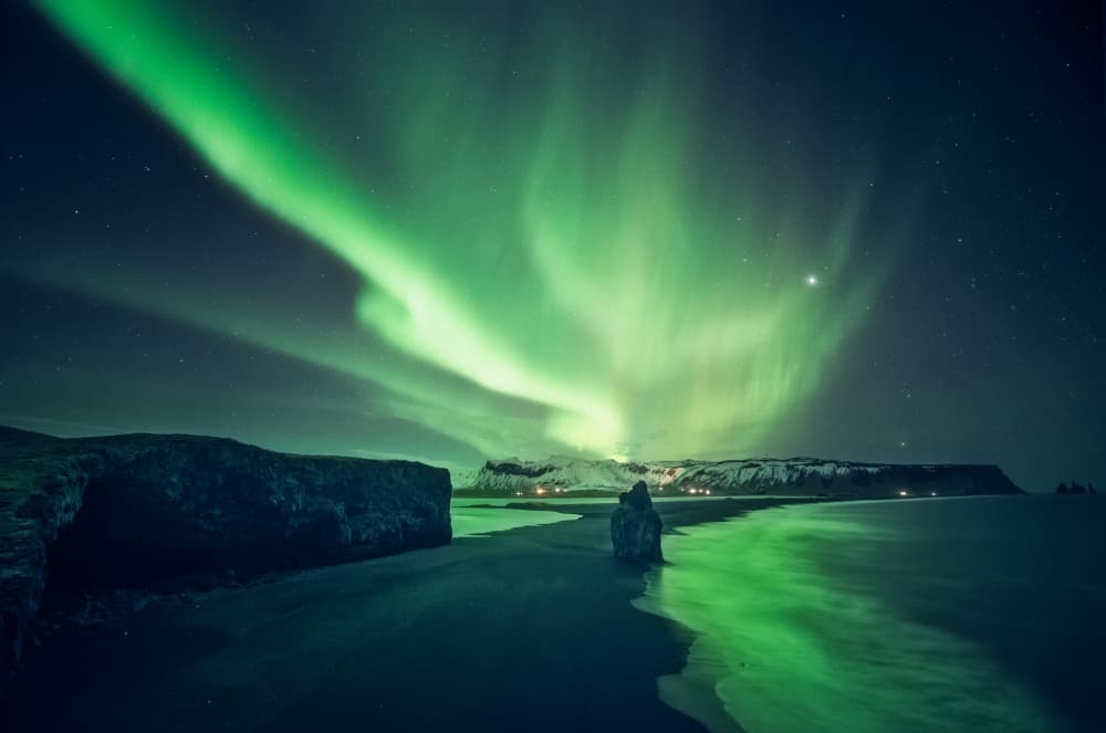 Green Northern Lights Reflection by David Martin Castan — canvas wall art