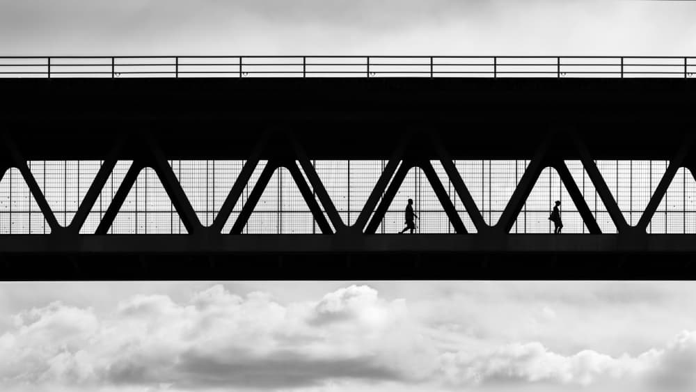 Silhouettes On Bridge by Andy Dauer — canvas wall art